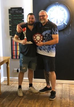 Somersham Darts Tournament 2025 winner Nathan Fillbrook l with Richard Mower r Tournament organiser and Captain of the Dukes of Hazzard darts team Somersham